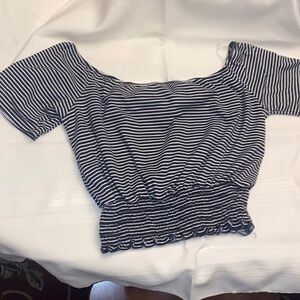 This is a cute blouse from marci! it’s black and white stripes!